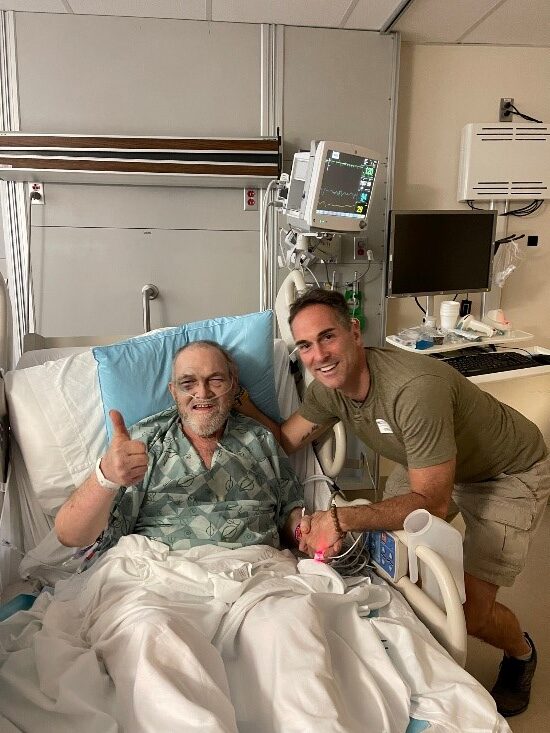 Jason Lynch with Pat in hospital supporting